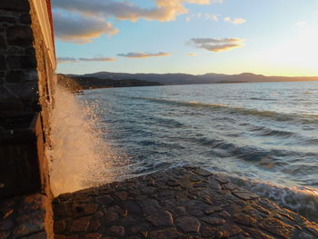 Scenic view of sea against sky during sunset
