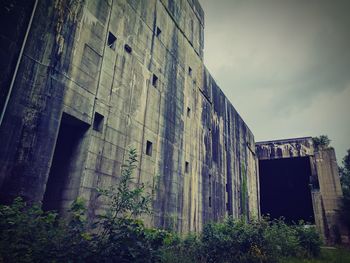 Abandoned building against sky