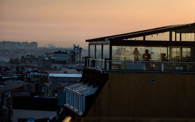 Cityscape against sky during sunset