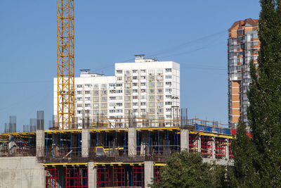 Buildings against clear sky in city