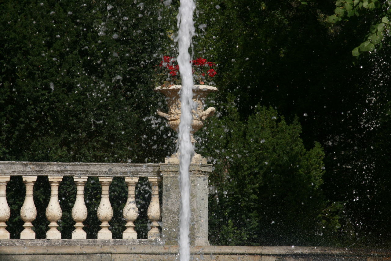 VIEW OF FOUNTAIN AGAINST BUILDING