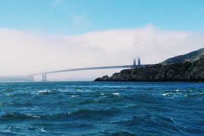 View of the golden gate bridge covered in fog