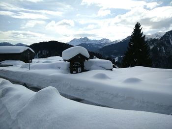 Scenic view of snow covered mountains