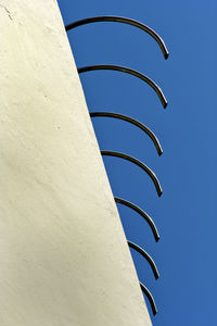 Low angle view of built structure against blue sky