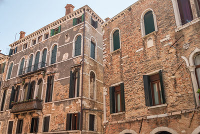 Low angle view of old building against sky