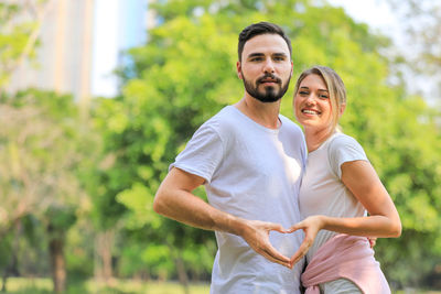 Young couple standing outdoors