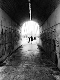 Tunnel leading towards bridge