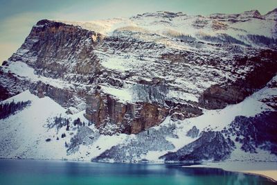 Scenic view of snow covered mountains