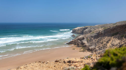 Scenic view of beach against sky