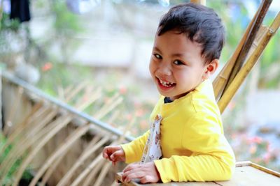 Portrait of cute boy smiling