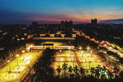 High angle view of illuminated buildings at night