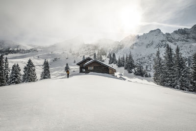 House on snow covered land