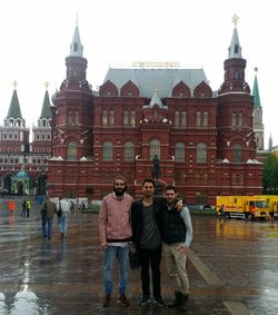 Tourists in front of building