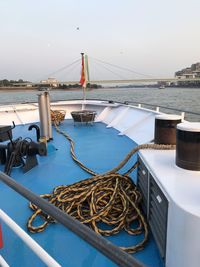 Ship moored on sea against sky