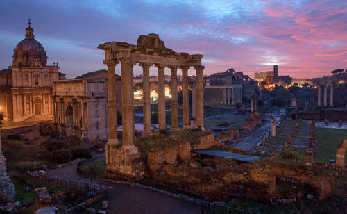 Historic building against sky at dusk