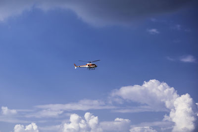 Low angle view of airplane against sky