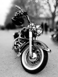 Close-up of bicycle parked on street