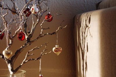 Close-up of christmas decoration hanging at home