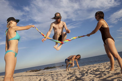 Friends hanging out on a beach