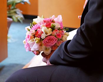 Close-up of woman holding flower