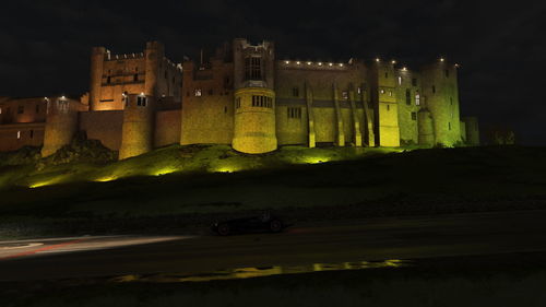 Illuminated buildings in city at night