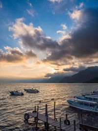 Scenic view of sea against cloudy sky