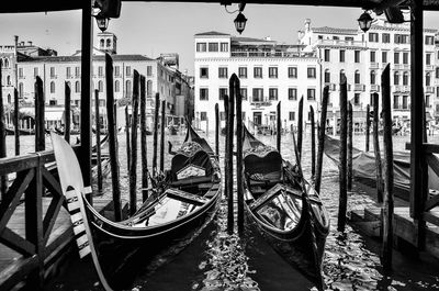 Boats moored in canal