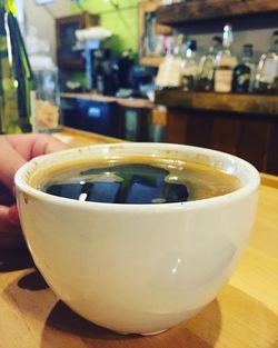 Close-up of coffee cup on table