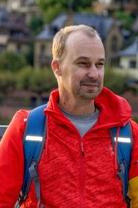 Thoughtful mature man standing outdoors