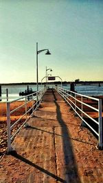 Empty jetty leading to sea