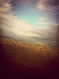 Scenic view of landscape against sky during sunset