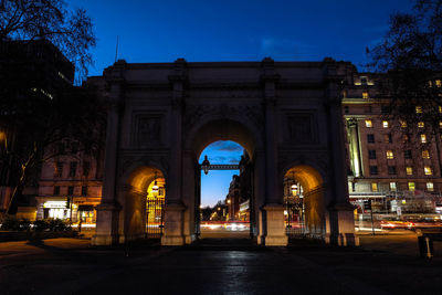 Illuminated building at night