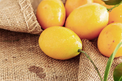 Close-up of fruits on burlap