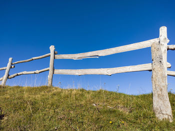 Wooden fence on a hill