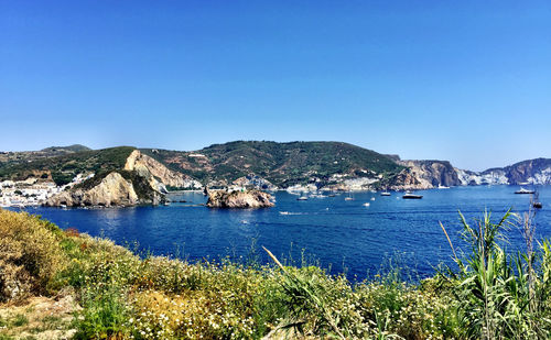 Scenic view of calm sea against clear sky