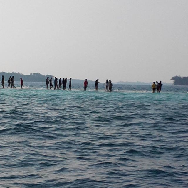 PEOPLE ON THE BEACH