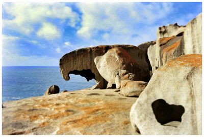 Scenic view of sea against cloudy sky