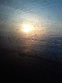 Close-up of wet window during rainy season