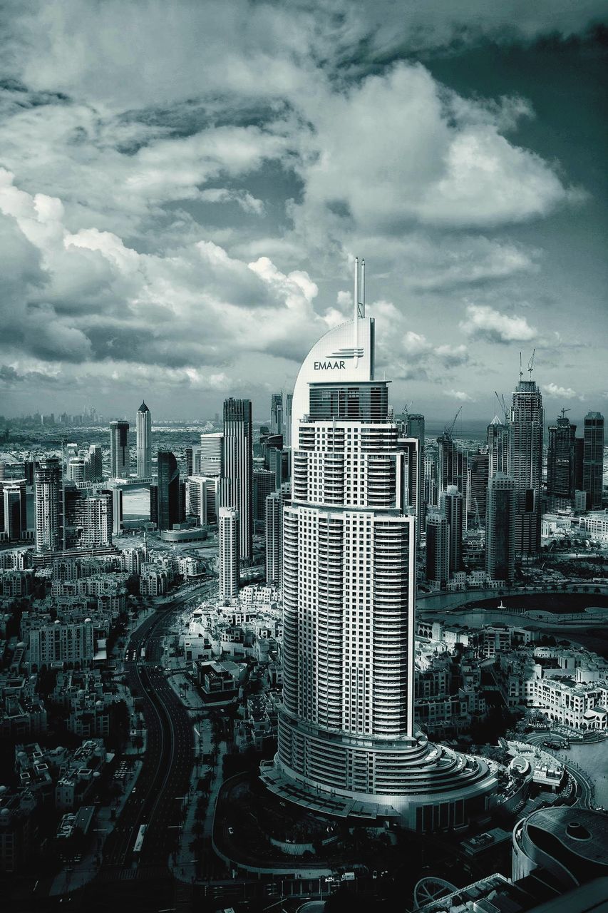 city, architecture, building exterior, built structure, building, cityscape, office building exterior, metropolis, sky, skyscraper, landscape, skyline, black and white, urban skyline, cloud, metropolitan area, horizon, residential district, monochrome, monochrome photography, nature, travel destinations, urban area, city life, high angle view, downtown district, no people, office, darkness, outdoors, financial district, transportation, street, road, tower block, aerial photography, travel, tower, development, aerial view, business