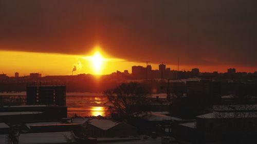 High angle view of townscape against sky during sunset