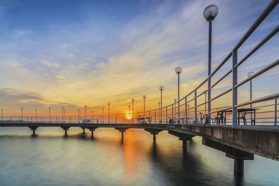 Bridge over river against sky