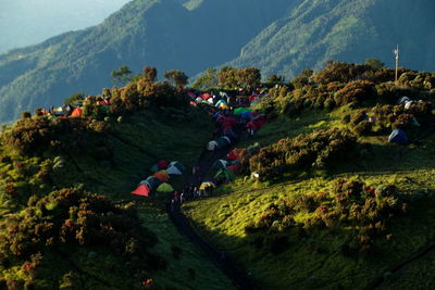 High angle view of people walking on mountain