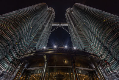 Low angle view of petronas against the sky