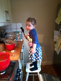 Girl standing at home