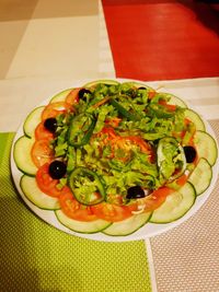 High angle view of salad in plate on table