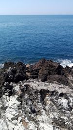 Scenic view of sea against clear sky