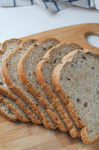 Close-up of bread on cutting board
