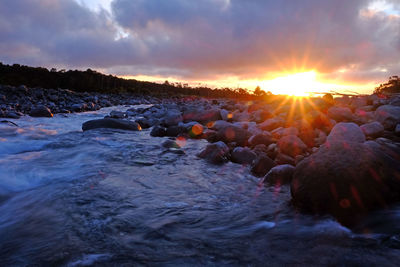 Rocks against sky during sunset