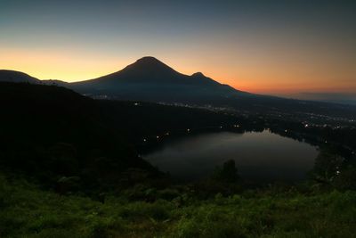 A sunrise view with sindoro mount and menjer cake background