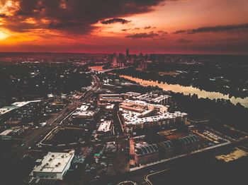High angle view of buildings against sky during sunset